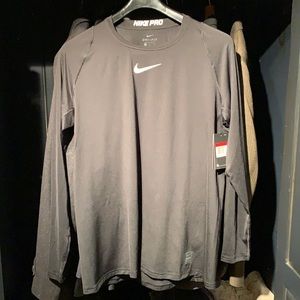 NWT Nike Dri-Fit long sleeve shirt.